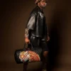 CATWALK CURRENCY DUFFLE