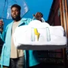 CLOUDY WITH A CHANCE OF SHARK DUFFLE