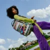 CREATE ANOTHER DAY SKATEBOARD-STRAP BACKPACK