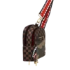 EXTERIOR GOLD ZIP POCKET SHARKS IN PARIS BACKPACK SLING