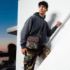EXTERIOR GOLD ZIP POCKET SHARKS IN PARIS MESSENGER SLING BAG