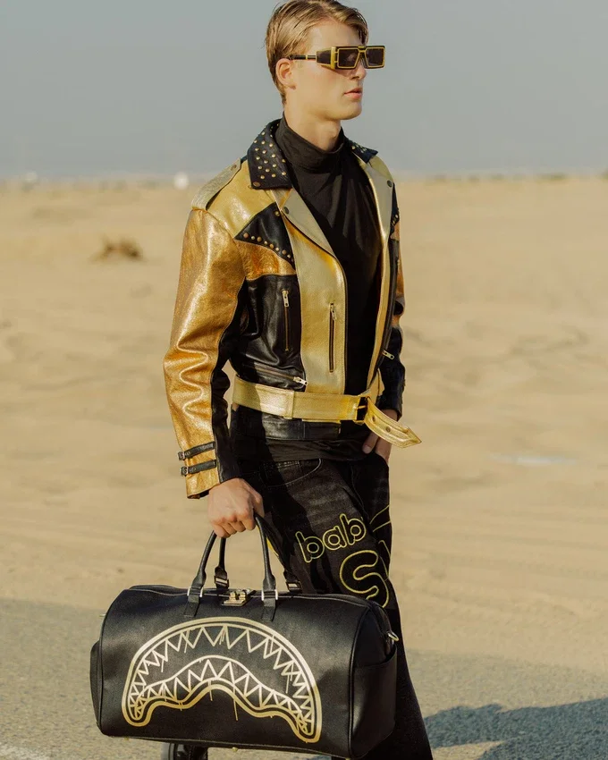GOLD FANG DUFFLE
