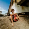 HENNY VICTORY LAP SKATEBOARD-STRAP BACKPACK
