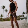 LET'S MAKE SOME NOISE SWIM SHORTS