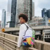 MEAN MONEY COLLAGE BACKPACK