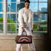 SHARKS IN PARIS GRIN & GRIND DUFFLE