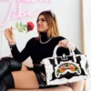 THE FLORAL CUT MINI DUFFLE